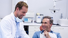 Man smiling at a dentist