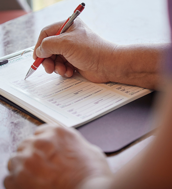 Dental patient filling out paperwork
