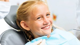 young girl in dental chair