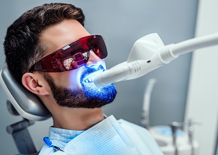 A man getting professional teeth whitening