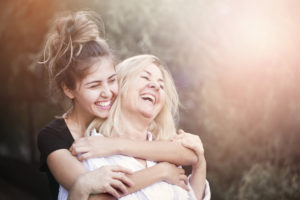 two women smiling happy 