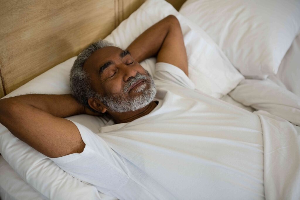 Man sleeping in a bed